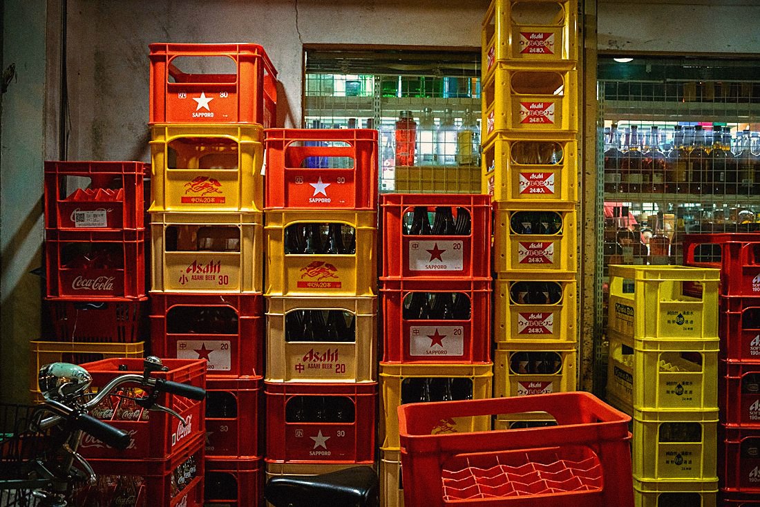 Stacked drinks crates in a storeroom